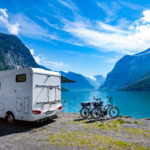 Family vacation travel, holiday trip in motorhome, Caravan car V Family vacation travel, holiday trip in motorhome, Caravan car Vacation. Beautiful Nature Norway natural landscape.
